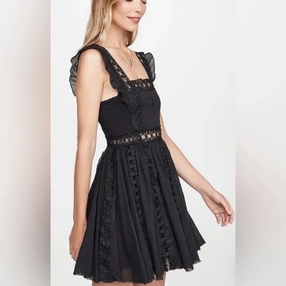 Free people Black lace mini dress in size M
